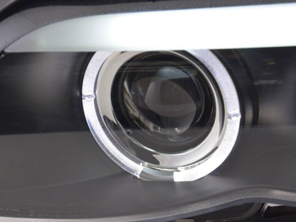 BMW X5 E53 headlights with black angel eye LED rings, Xenon lights, for 2003-2006, by K2 Industries.