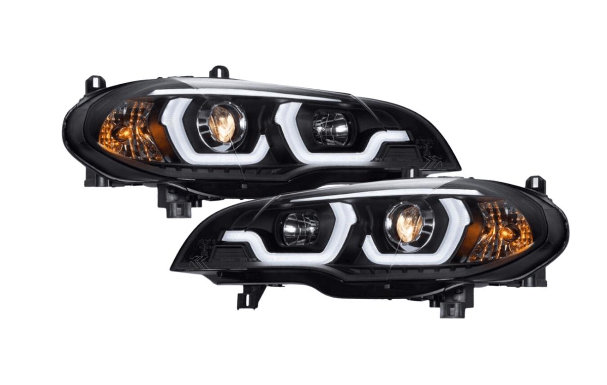 BMW X5 E70 3D Design Headlights by K2 Industries for 2007-2013 model with sleek, modern headlight design and clear lenses.