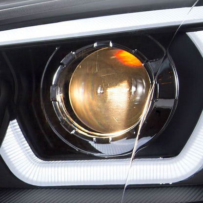 BMW X5 E70 headlights by K2 Industries, 2007-2013, featuring 3D design with clear lens and modern lighting elements.