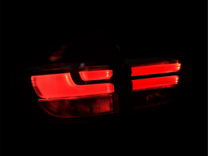 BMW X5 E70 LCI style LED tail light by K2 Industries, rear view showing sleek design and bright LED illumination.