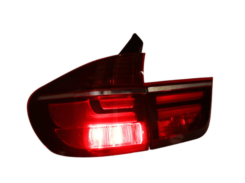 BMW X5 E70 LCI style LED tail light by K2 Industries, showing the sleek design and illuminated red and clear sections.