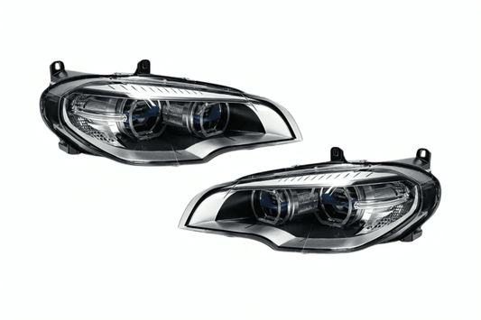 BMW X5 E70 OE Style Angel Eyes projector headlight by K2 Industries, showing the clear lens and distinctive angel eye rings.
