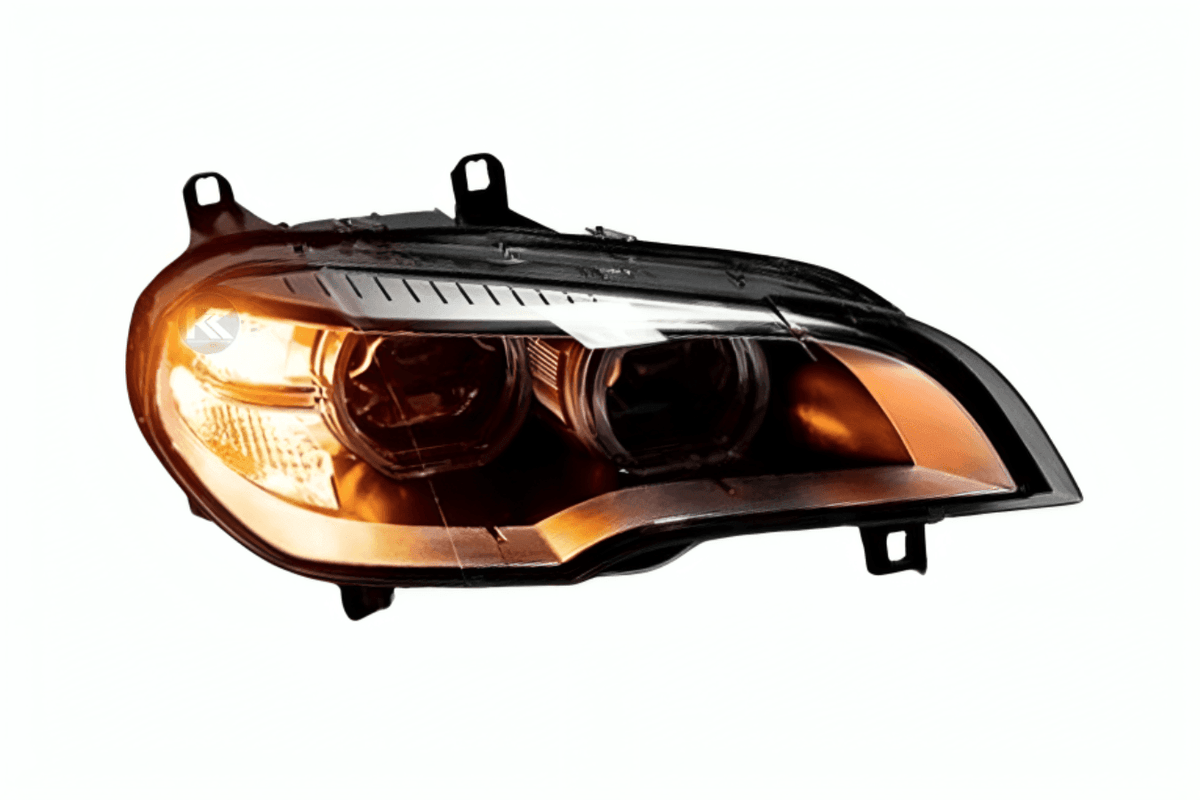 BMW X5 E70 projector headlights with OE style angel eyes by K2 Industries, showing the front view of the headlight assembly.