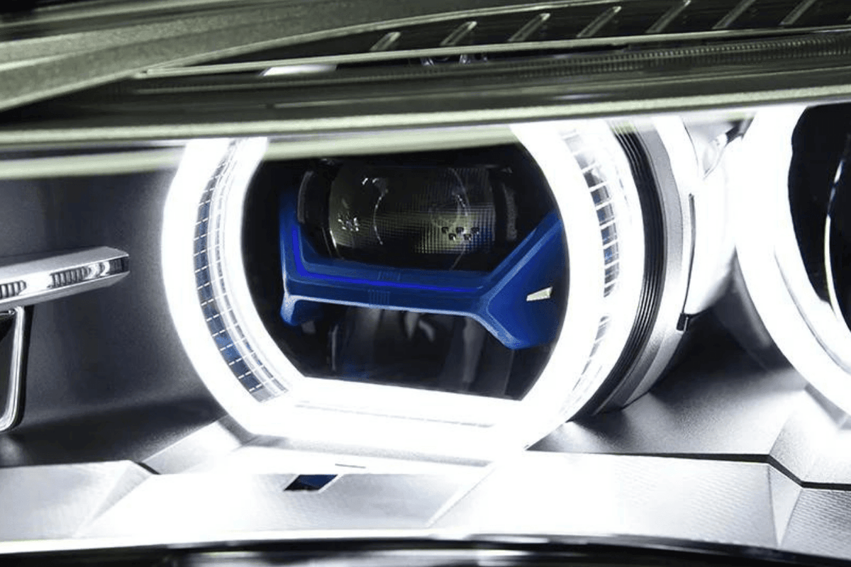 BMW X5 F15 F16 headlights with laser-style blue accents from K2 Industries, upgrade for models 2012-2019, showcasing sleek design.