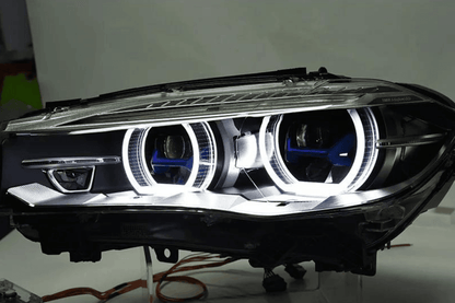 BMW X5 F15 F16 headlights with laser-style blue accents, upgrade by K2 Industries for models 2012-2019, close-up view