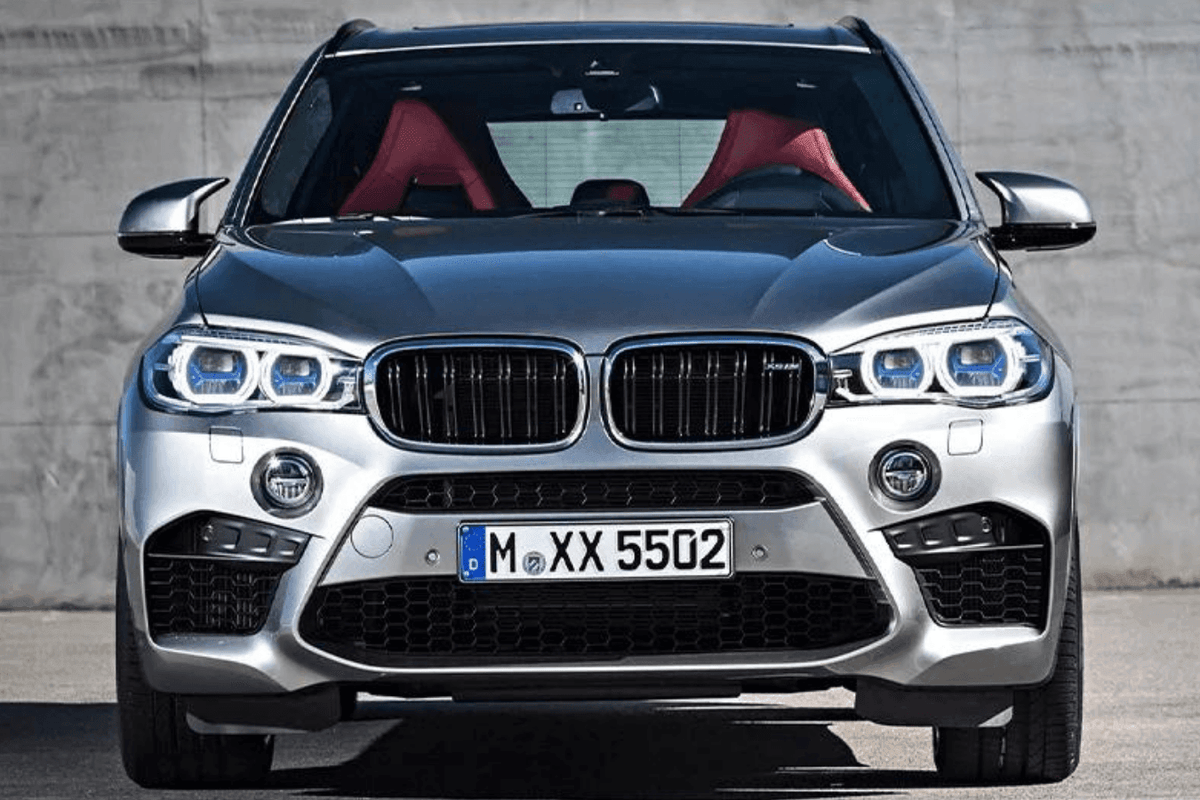BMW X5 F15 F16 laser-style blue accent headlights upgrade by K2 Industries, showing sleek blue-lit headlights on the vehicle.