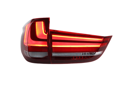 BMW X5 F15 OE Plus tail lights upgrade by K2 Industries, showing sleek red and clear lens tail light assembly for 2014-2018 models.