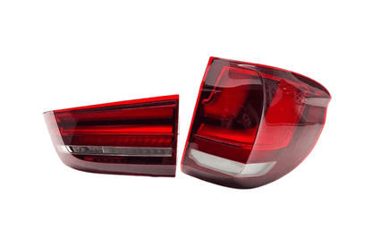 BMW X5 F15 OE Plus tail lights upgrade by K2 Industries, showing sleek red and clear tail light assemblies for 2014-2018.