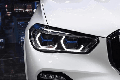 BMW X5 G05 modernized projector headlights with blue accents, upgrade by K2 Industries for 2019-2024 models, featuring sleek headlight design.