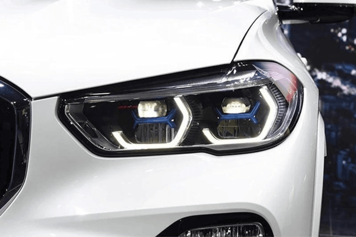 BMW X5 G05 modernized blue accent projector headlights upgrade by K2 Industries, showcasing sleek headlight design with blue accents.