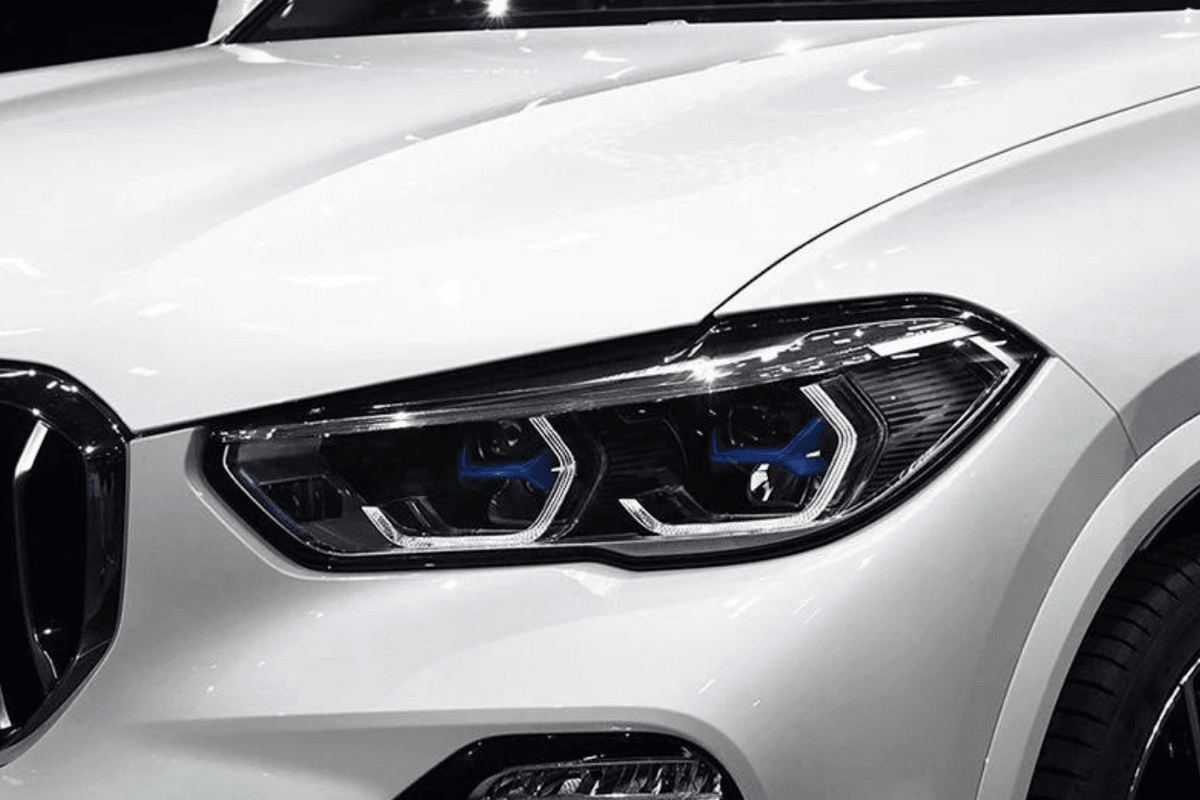BMW X5 G05 projector headlights upgrade with modern blue accents by K2 Industries, designed for 2019-2024 models.