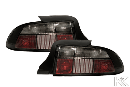 BMW Z3 OEM style smoked tail lights by K2 Industries, showing sleek, tinted tail light housings for 1990-1999 BMW Z3.