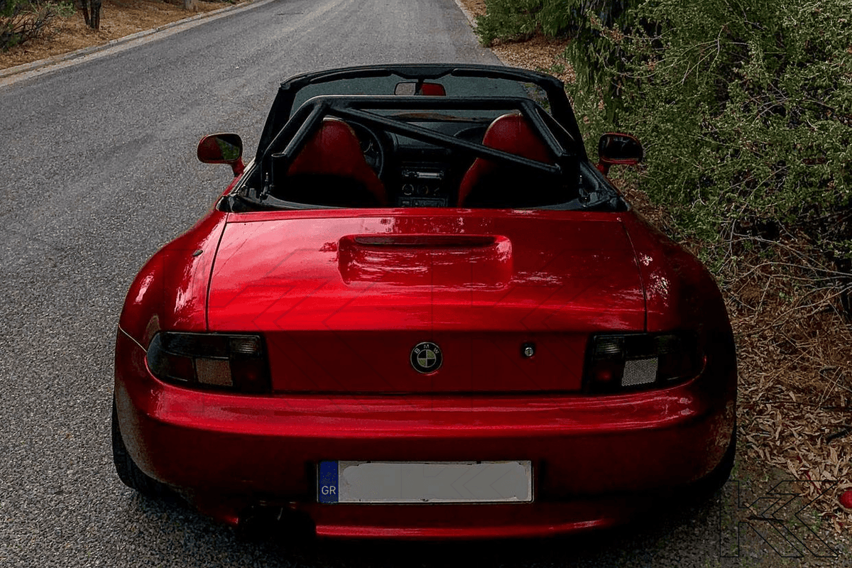 BMW Z3 OEM style smoked tail lights by K2 Industries, showing sleek black-tinted design for 1990-1999 models
