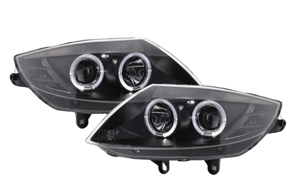 BMW Z4 E85/E86 black headlight set by K2 Industries for 2003-2008 models, showing the sleek headlights with clear lenses.