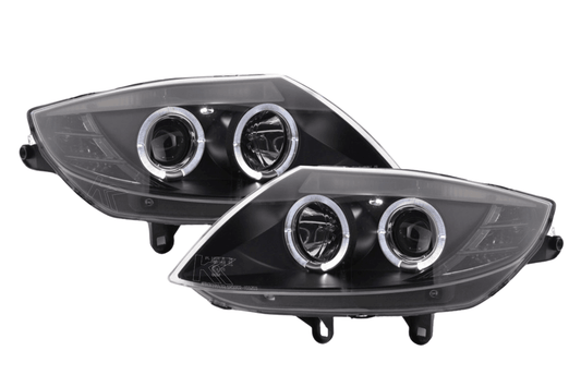 BMW Z4 E85/E86 black headlight set by K2 Industries for 2003-2008 models, showing the sleek headlights with clear lenses.