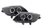 BMW Z4 E85/E86 black headlight set by K2 Industries for 2003-2008 models, showing the sleek headlights with clear lenses.