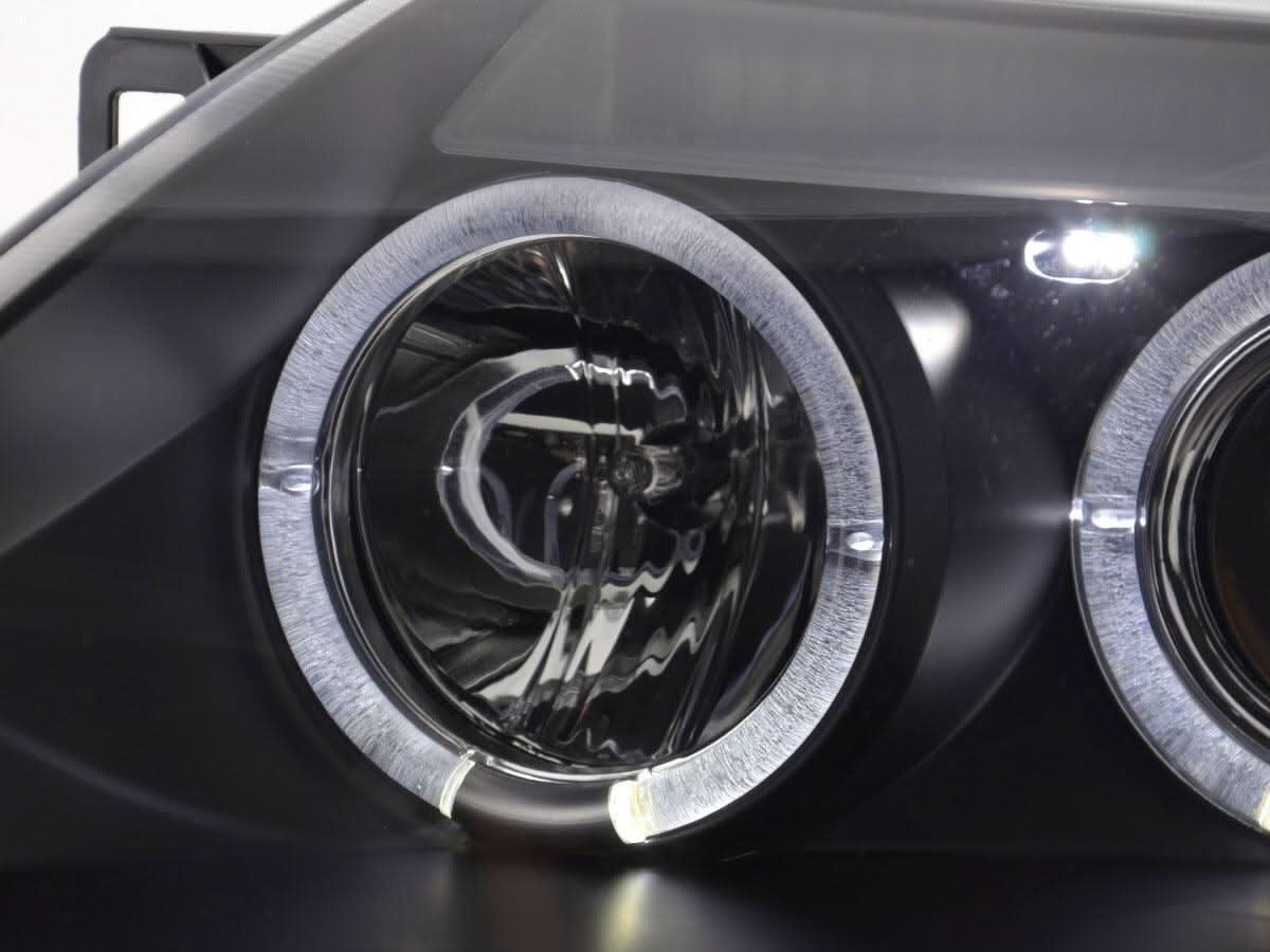 Black BMW Z4 E85/E86 Type Z4 headlight set from K2 Industries for 2003-2008 models, showing close-up of headlight lenses and housing.