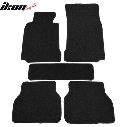 Black carpet car floor mats for BMW E39 5 Series 1997-2003 by K2 Industries, set of 5 nylon mats with border detail.