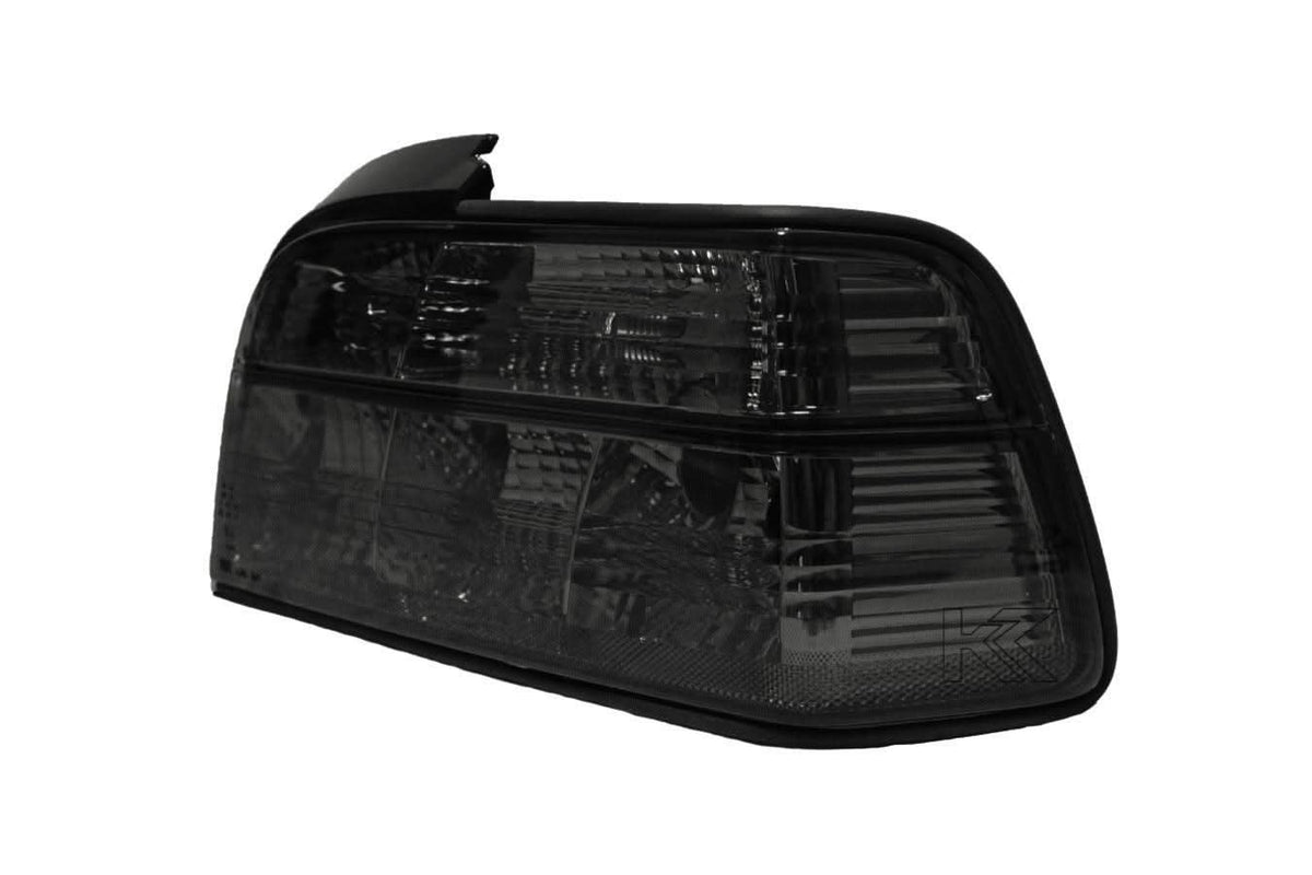 BMW E36 Coupe smoked and clear tail lights by K2 Industries, showing the sleek design of these automotive tail lights.