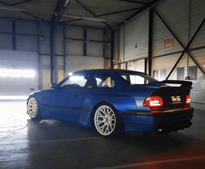 BMW E36 coupe and convertible JDM red smoke LED bar tail lights by K2 Industries, showing sleek red and smoke finish.