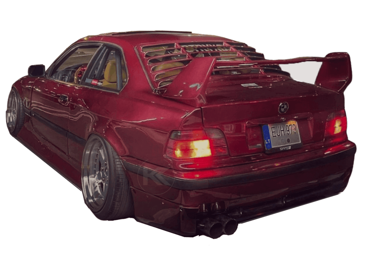 BMW E36 M3 rear bumper splats by K2 Industries, close-up of black protective rear splats on the car's bumper.