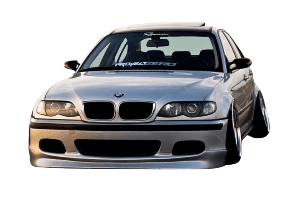 BMW E46 Sedan/Touring front lip in JDM style V1 by K2 Industries, showcasing the sleek, aerodynamic design on a white car.
