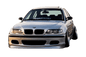 BMW E46 Sedan/Touring front lip in JDM style V1 by K2 Industries, showcasing the sleek, aerodynamic design on a white car.