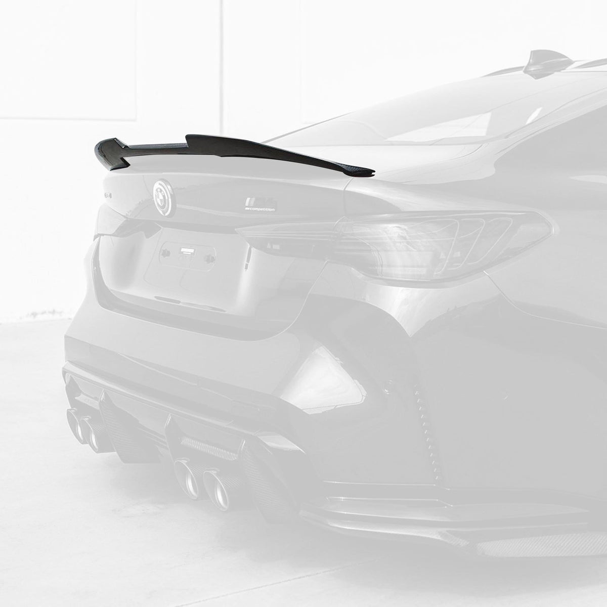BMW 4 Series G22 G82 M4 PSM Style carbon fiber trunk spoiler by K2 Industries, showing the sleek, aerodynamic design on the car.
