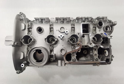 Bayern Automotive DAS MOTOR HAUS EA888 Gen 2 engine reconditioning kit with various engine parts and components on a workbench.