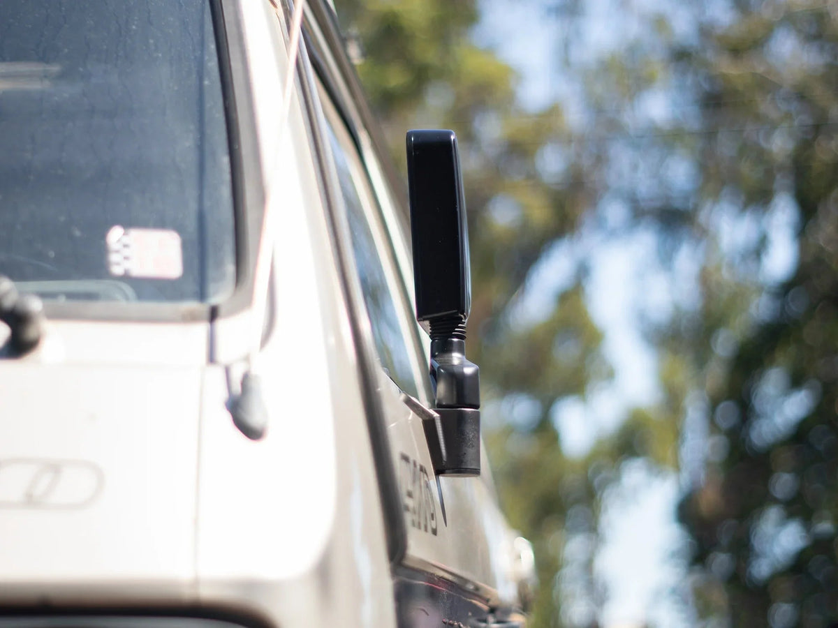 GoWesty Deluxe Manual Mirror Kit for Vanagon showing assembled side mirrors with mounting brackets and adjustment mechanisms