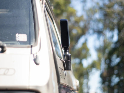GoWesty Deluxe Manual Mirror Kit for Vanagon showing assembled side mirrors with mounting brackets and adjustment mechanisms