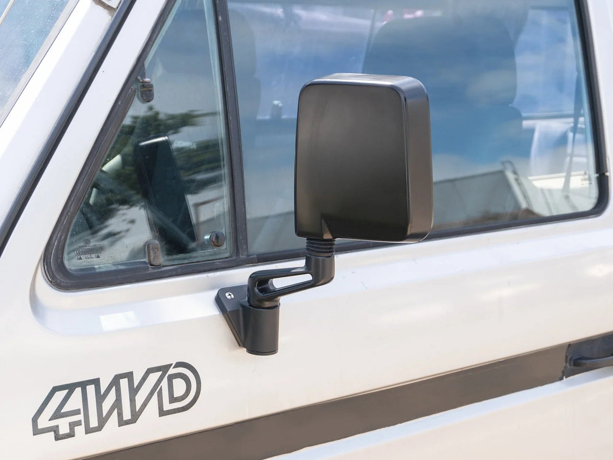 GoWesty Deluxe Manual Mirror Kit for Vanagon, showing the complete set of side mirrors with mounting hardware.