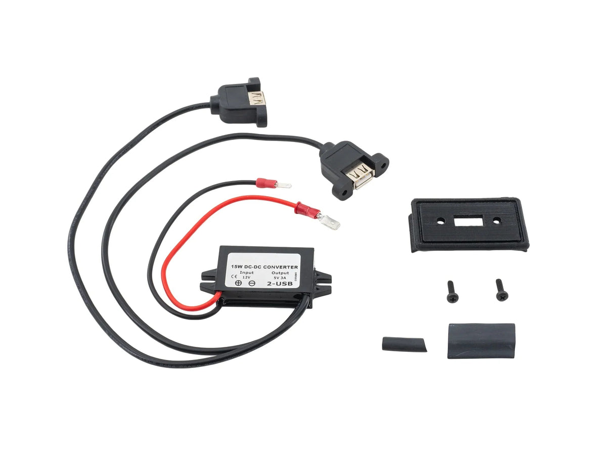 GoWesty USB charging port conversion installed in a map light, providing convenient USB charging access for vehicles.