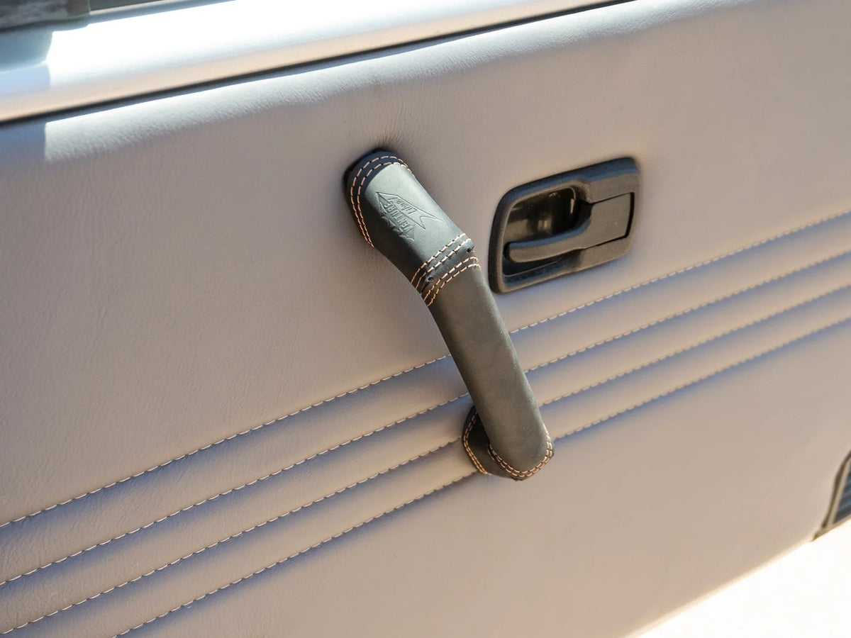 GoWesty interior leather trim kit with black leather panels and stitching for car interior customization.