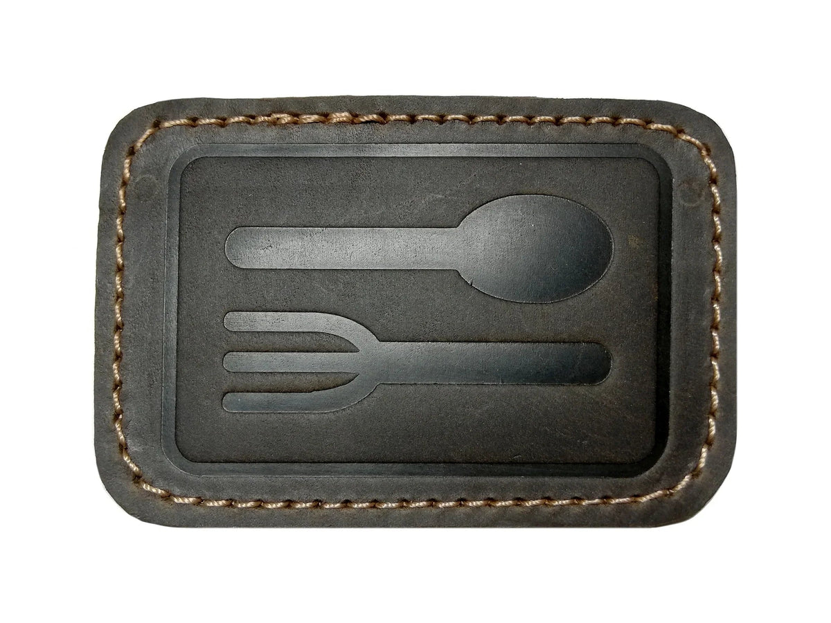 Leather patches for GoWesty combi bags, featuring natural brown leather with stitched edges, designed for repair and customization.