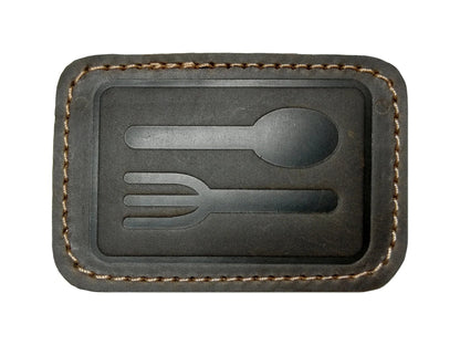 Leather patches for GoWesty combi bags, featuring natural brown leather with stitched edges, designed for repair and customization.