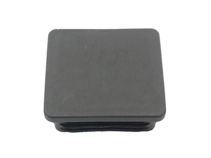 Black square snap-in hitch hole cap by GoWesty, designed to cover and protect trailer hitch receiver opening.