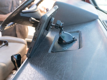 GoWesty Vanagon Ashtray Delete Kit front for cleaner interior, featuring sleek, black plastic cover with mounting hardware visible