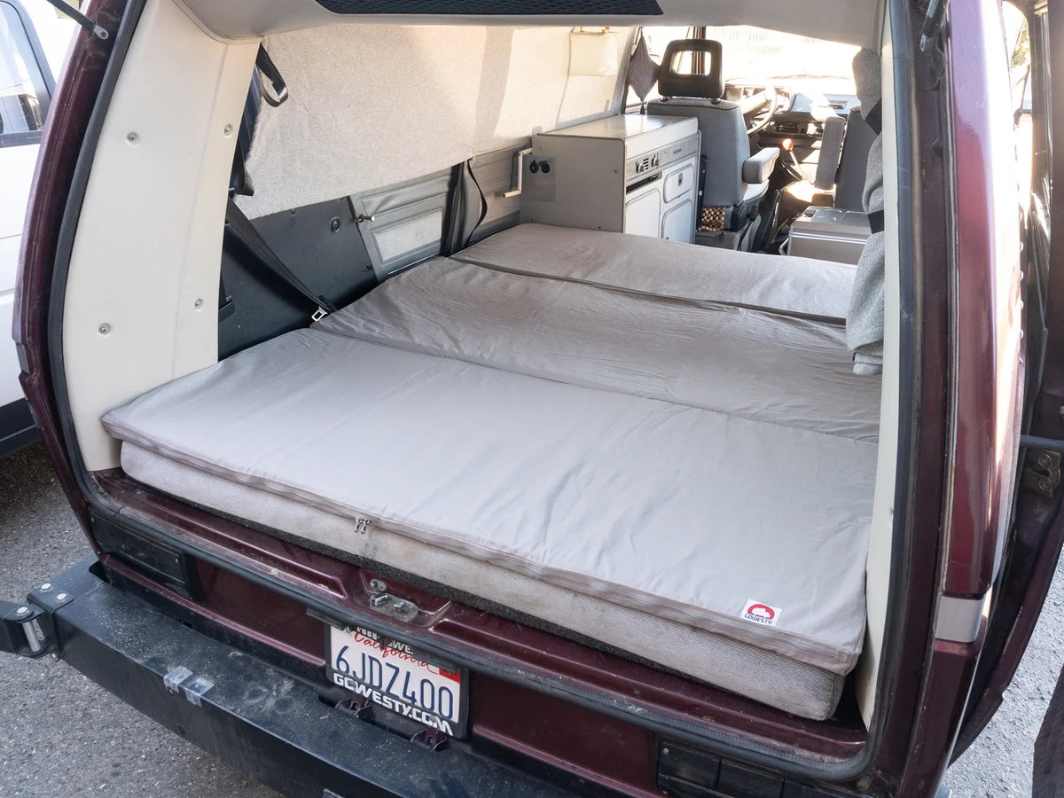 GoWesty slip-cover for large mattress topper, showing durable fabric and tailored fit for extra comfort and protection.