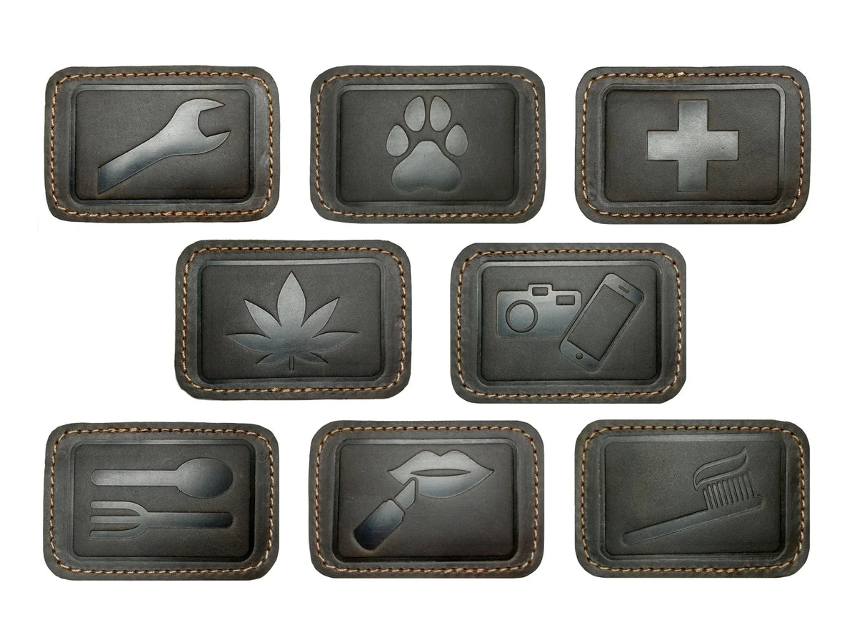 Leather patches for GoWesty combi bags, showing close-up of durable, natural leather material and stitching details.