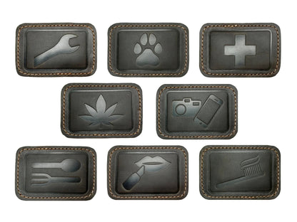 Leather patches for GoWesty combi bags, showing close-up of durable, natural leather material and stitching details.