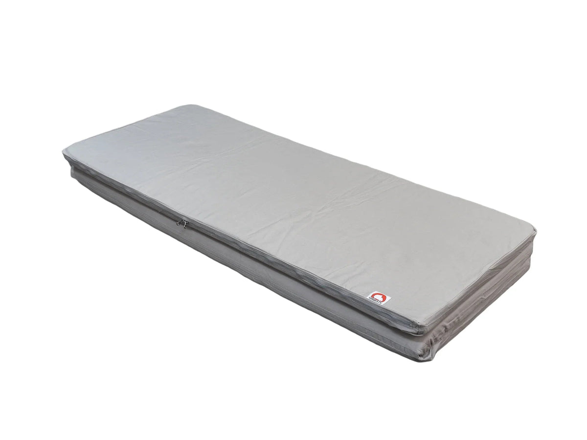 GoWesty slip-cover for large mattress topper showing a fitted fabric cover designed to protect and secure the topper.