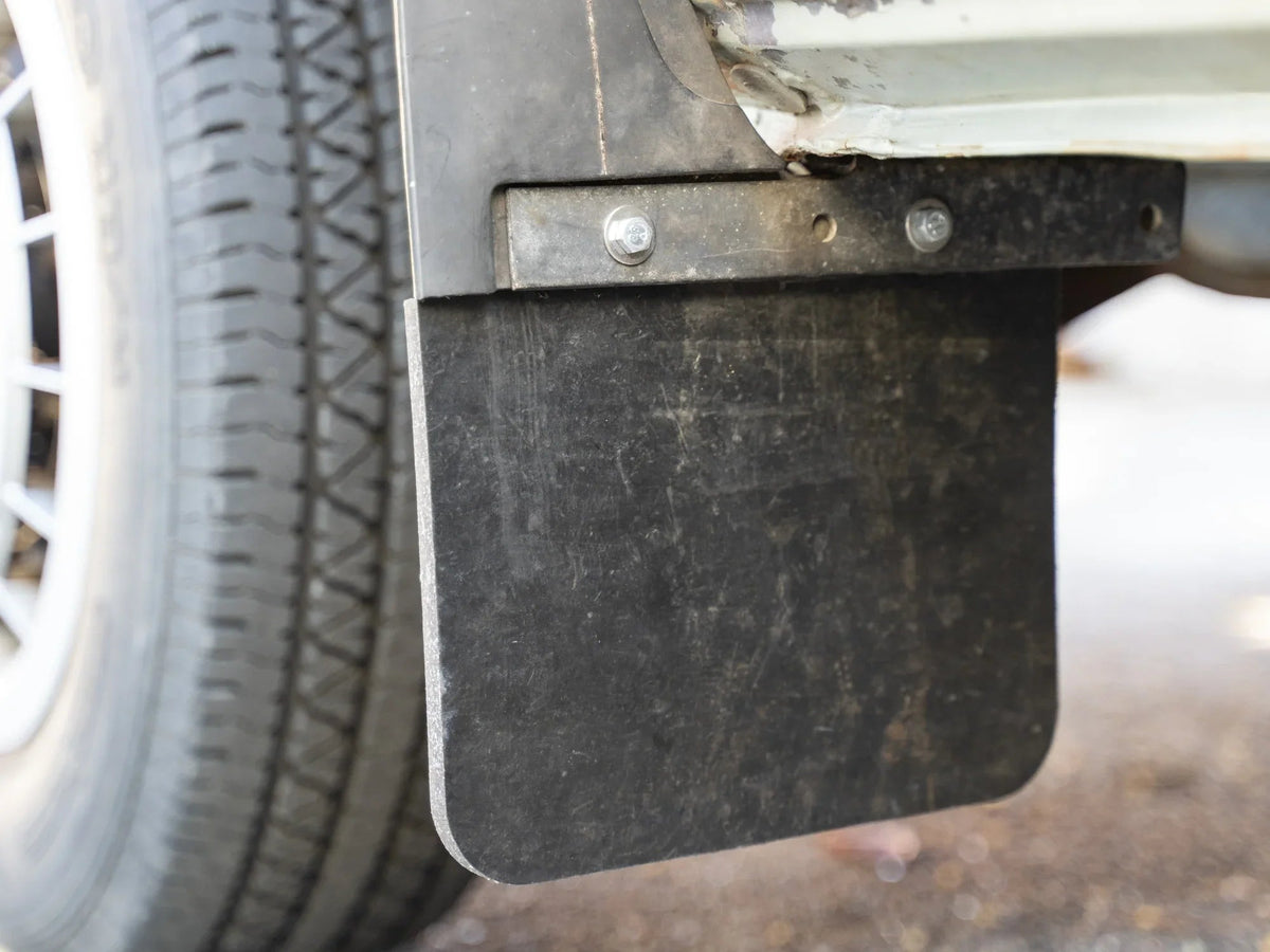 GoWesty Vanagon mud flap repair kit with tools and parts for easy mud flap maintenance and replacement.