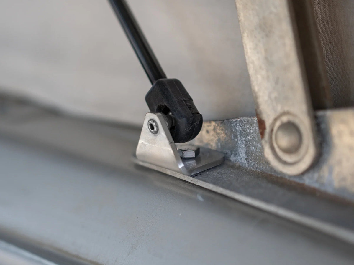 GoWesty Pop-Top Lift Assist Basic Kit installed on a Vanagon, helping to easily lift and support the pop-top for convenient access.