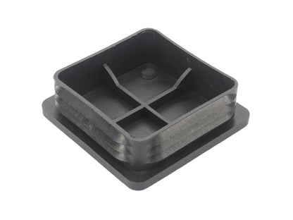 Black square snap-in hitch hole cap for vehicle trailer hitch, designed by GoWesty to cover and protect hitch openings.