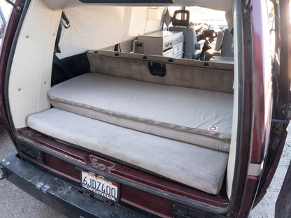 GoWesty slip-cover for large mattress topper, showing a fitted fabric cover designed to protect and extend the lifespan of the topper.