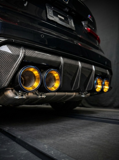 Set of four carbon fiber exhaust tips for BMW M series, featuring black finish and 60-80mm inlet size.