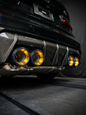 Set of four carbon fiber exhaust tips for BMW M series, featuring black finish and 60-80mm inlet size.