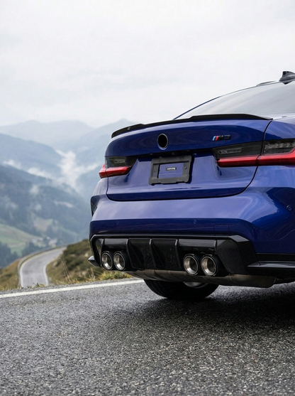Set of four carbon fiber exhaust tips for BMW M series, featuring sleek black finish and 60-80mm inlets, by K2 Industries.