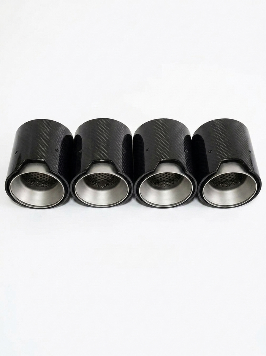 Set of four carbon fiber exhaust tips for BMW M series, 60-80mm inlet, featuring sleek black finish and brand logo.
